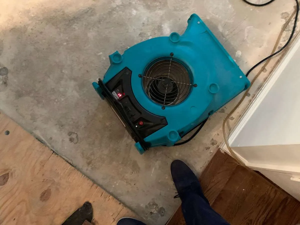 Air mover drying subfloor during Leak Detection & Repair in Anaheim
